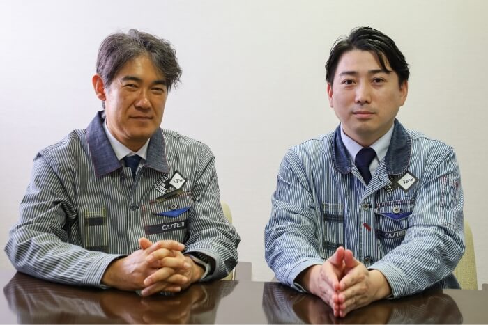 戸田有紀専務（＝写真右）と工機部工機開発課の三浦陽一課長